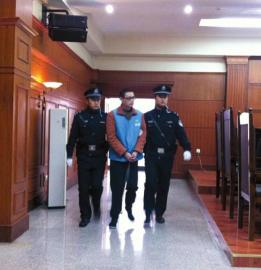 趙勇被帶上法庭。