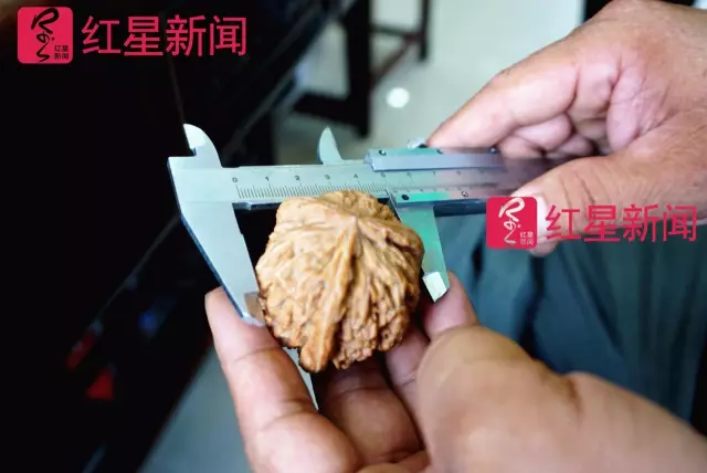 文玩核桃遇冷由幾萬(wàn)一對(duì)降到5元沒人要？商戶否認(rèn)