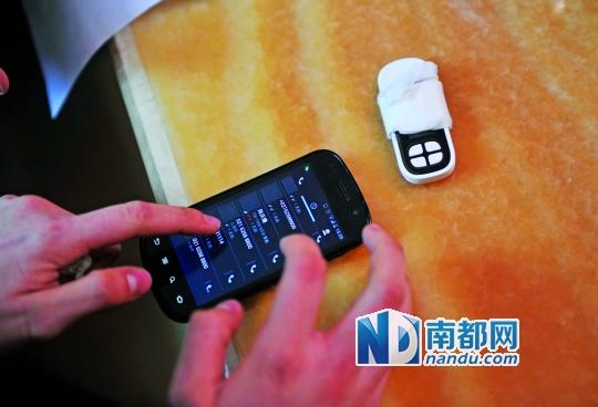 一個號碼為021-62588800的電話自稱上海靜安區公安分局，騙走了小程148萬。記者 梁煒培 攝