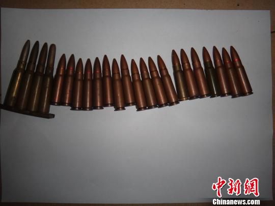 覃某主動上交的23發子彈?！＄娦馈z